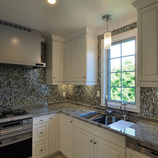 Mid-sized victorian kitchen pantry designs - Inspiration for a mid-sized victorian l-shaped kitchen pantry remodel in Tokyo with white cabinets, white backsplash, white appliances and gray countertops