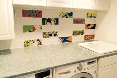 Mid-sized eclectic single-wall dedicated laundry room photo in Toronto with a drop-in sink, raised-panel cabinets, white cabinets, granite countertops, a side-by-side washer/dryer and white walls