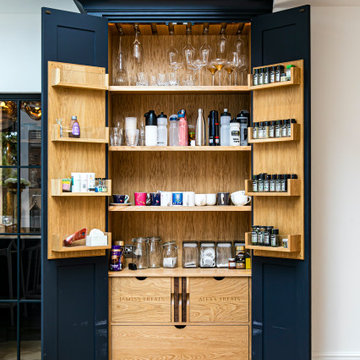 An impressive handmade shaker-style kitchen that is the social hub of the home