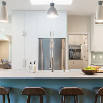 Shapely Pendant Lights Shine Over the Island