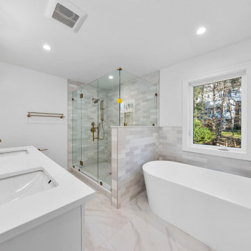 Primary Bath with Freestanding Tub and Gold Filler