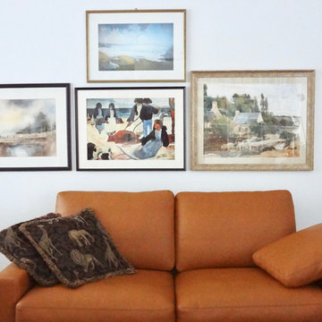 Bilderwand - alte Bilder in moderne Hängung