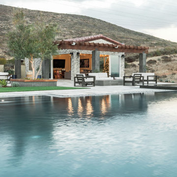 Gorgeous Infinity Pool with mulitple outdoor living spaces