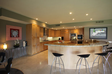 Inspiration for a large modern l-shaped beige floor open concept kitchen remodel in Other with an undermount sink, shaker cabinets, light wood cabinets, granite countertops, stainless steel appliances, an island and beige countertops