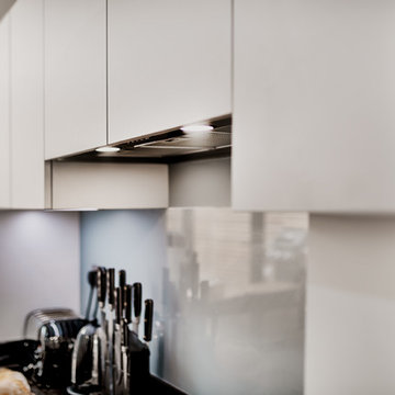 Black & white kitchen with interior solution in concrete finish