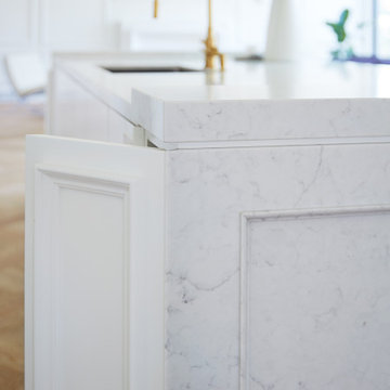 Sleek, White, Quartz-Embellished Kitchen