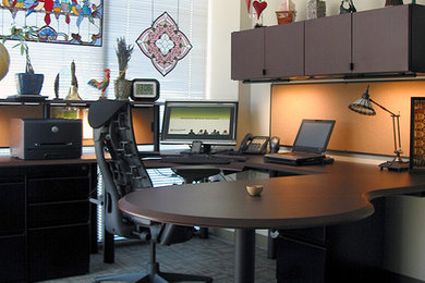 Photo of a contemporary home office in Dallas with a freestanding desk.