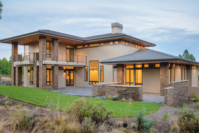 Inspiration for a large contemporary two-story wood exterior home remodel in Other