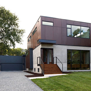 Inredning av ett modernt mellanstort betonghus, med två våningar och platt tak