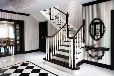 Staircase - traditional wooden u-shaped staircase idea in Other with painted risers