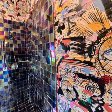 Custom Artistic Hallway Bathroom with Iridescent Tile and Bold Design
