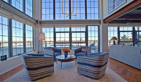 Tour a Warm Industrial Condo High Up in a Former Grain Silo