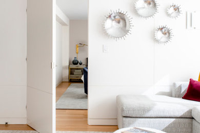 Example of a minimalist family room design in New York