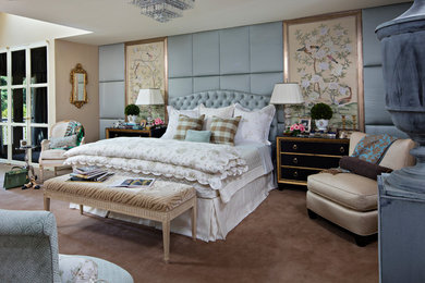 Example of a large master carpeted bedroom design in Philadelphia with blue walls and no fireplace