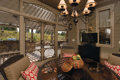 Inspiration for a traditional backyard verandah in Atlanta with a roof extension.