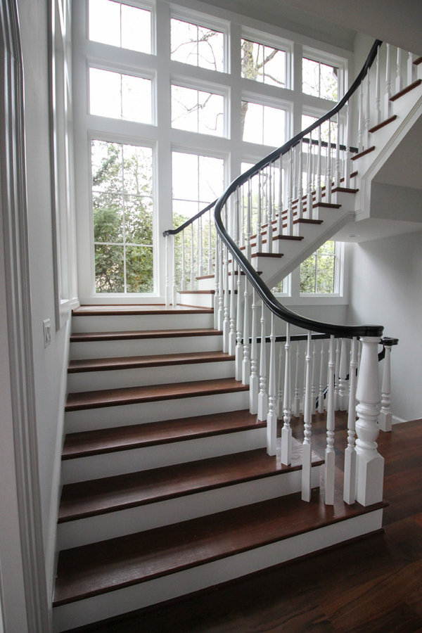 Powerful Impression by Floating Staircase in Suburban Foyer