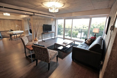 Urban family room photo in Montreal