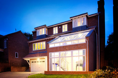 Contemporary house exterior in Other.