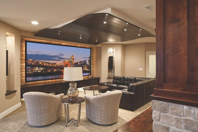 Elegant carpeted home theater photo in Cincinnati with beige walls