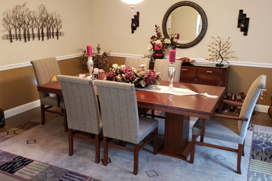 Example of a minimalist dining room design in New York