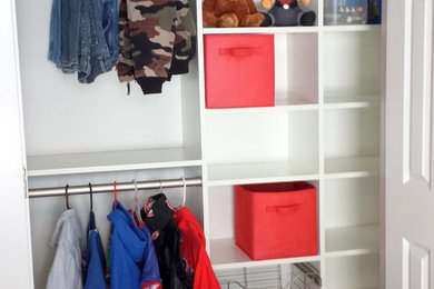 Boy's Reach-In closet for clothing and toys
