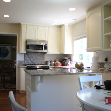 Refaced Cabinets with Wilmington Door in Buttercream.