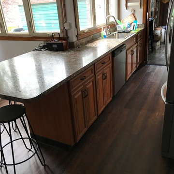 cabinet refacing---cherry with new countertops