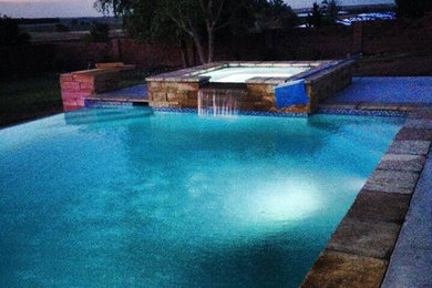 Mountain style pool photo in Austin