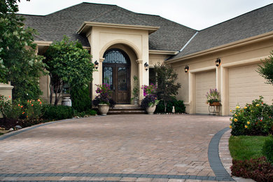 Example of a southwest home design design in Omaha
