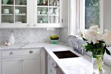 Kitchen - large transitional l-shaped marble floor and multicolored floor kitchen idea in Other with an undermount sink, shaker cabinets, white cabinets, marble countertops, multicolored backsplash, marble backsplash and stainless steel appliances