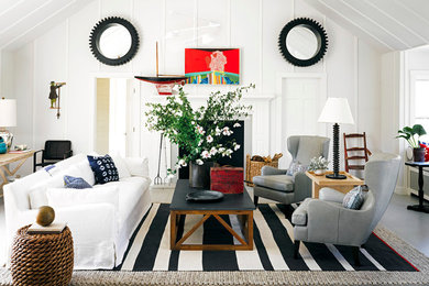 Inspiration for a coastal formal painted wood floor living room remodel in Boston with white walls and a standard fireplace