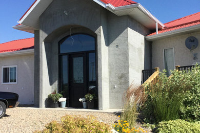Example of a trendy exterior home design in Other