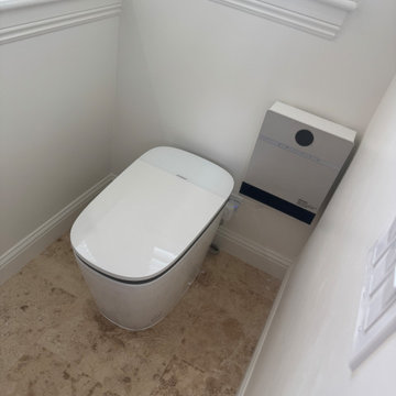 Curd-less walk-in shower; heated floors in bathroom + shower+bench LED