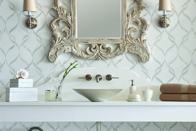 Bathroom - mid-sized contemporary 3/4 stone tile marble floor bathroom idea in San Francisco with white cabinets, a two-piece toilet, white walls, a vessel sink and quartz countertops