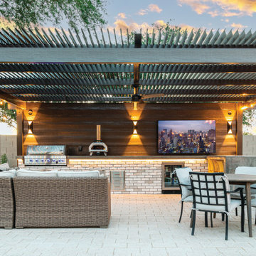 Contemporary Family Living with Outdoor Kitchen and Fireplace