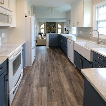 Two-Tone White & Blue Kitchen with Smoke Stained Quartz Countertops