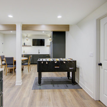 Warm & Inviting Basement Retreat with Kitchenette and Reading Nook