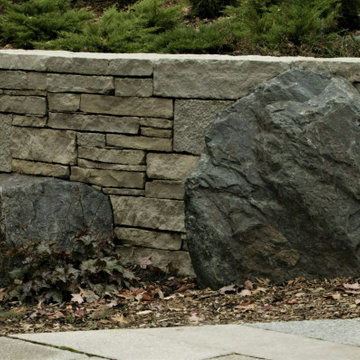 Hand Stacked Stone Wall and Boulders