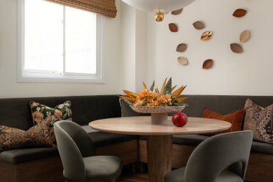 Inspiration for a small contemporary dark wood floor and brown floor breakfast nook remodel in Toronto with white walls and no fireplace