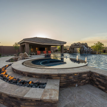 Natural Stone Freeform Pool + Perimeter Overflow Spa
