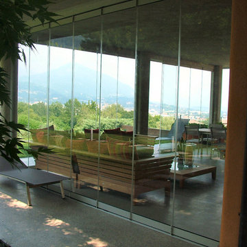 Patio closed off with folding glass doors, water and airproof