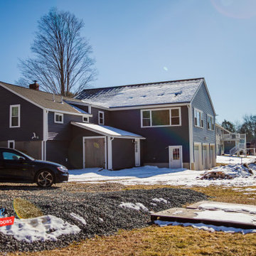 Conventional House Addition with 3 Car Garage In East Bridgewater, Massachusetts