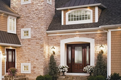 Example of an eclectic entryway design in Other