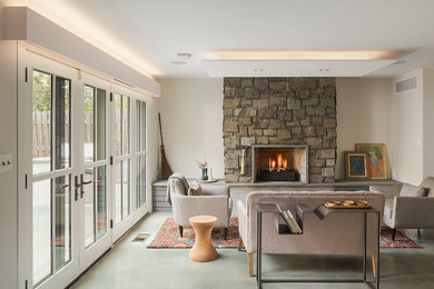 Example of a mid-sized transitional living room design in Philadelphia with a stone fireplace
