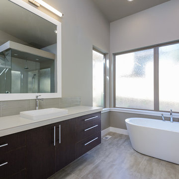 Contemporary master bathroom with walk-in closet