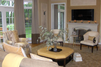 Large elegant formal and open concept carpeted living room photo in Other with beige walls, a standard fireplace, a wood fireplace surround and a wall-mounted tv