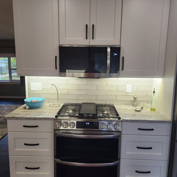 Modern Kitchen Transformation Done in New Classic White Cabinets