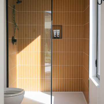 Sunny Walk-In Shower with Yellow Glass Tile