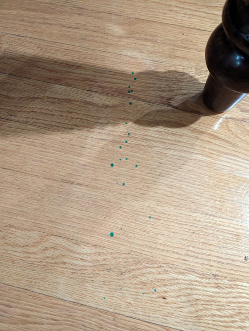 How to remove ink from wooden floor?