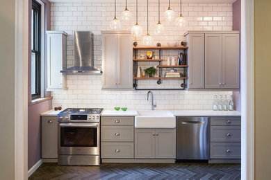 Example of a small transitional galley slate floor and gray floor eat-in kitchen design in Other with a farmhouse sink, shaker cabinets, gray cabinets, quartz countertops, white backsplash, subway tile backsplash, stainless steel appliances, no island and white countertops